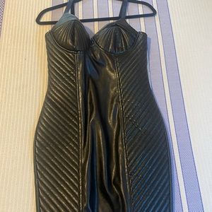 Sexy fitted black dress; minimal stretch.